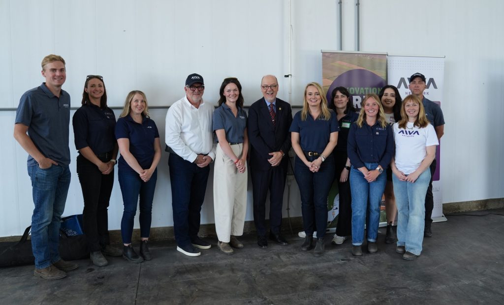 Manitoba's Minister of Innovation and New Technology, Mike Moroz, with the AIVA Network and EMILI Innovation Farms teams at AIVA's Demo Day.